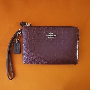 Coach Signature Embossed Wristlet in Rich Burgundy